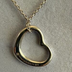 Tiffany & Co. Authentic 925 heart pendant, EUC. Comes with COA.  Beautiful gift!